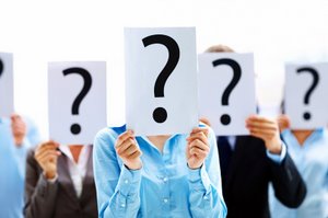 BUSINESS PEOPLE WITH QUESTION MARK- © Yuri Arcurs | Dreamstime.com